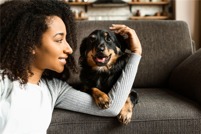 pet parent with happy puppy